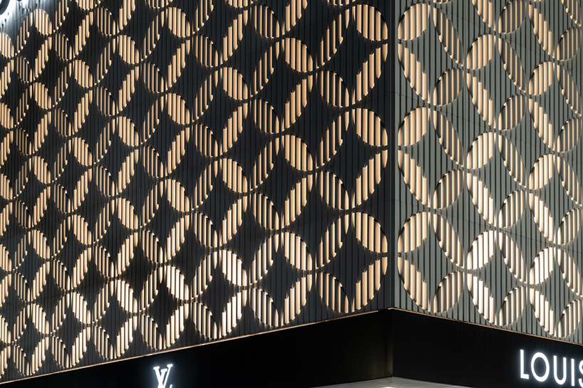 louis vuitton's cancun boutique unveils concrete facade with sculpted flower motif