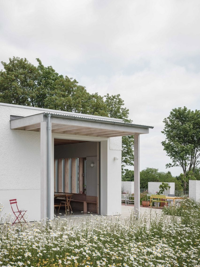 Exterior view of renovated home by Medium