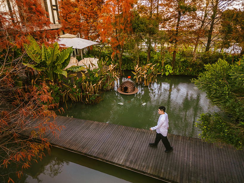 four floating wooden huts shape cheng tsung feng's duck nest installations
