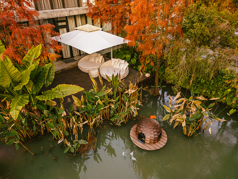 four floating wooden huts shape cheng tsung feng's duck nest installations