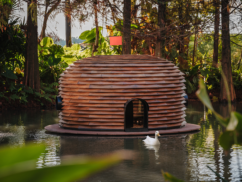 four floating wooden huts shape cheng tsung feng's duck nest installations