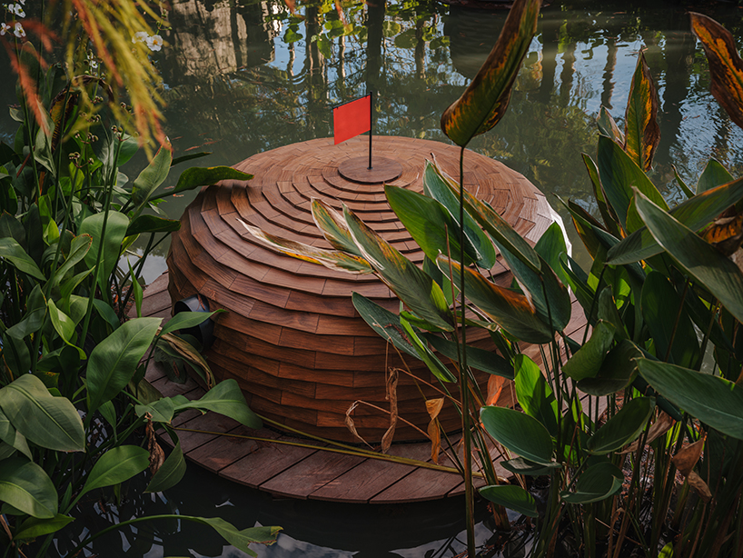 four floating wooden huts shape cheng tsung feng's duck nest installations