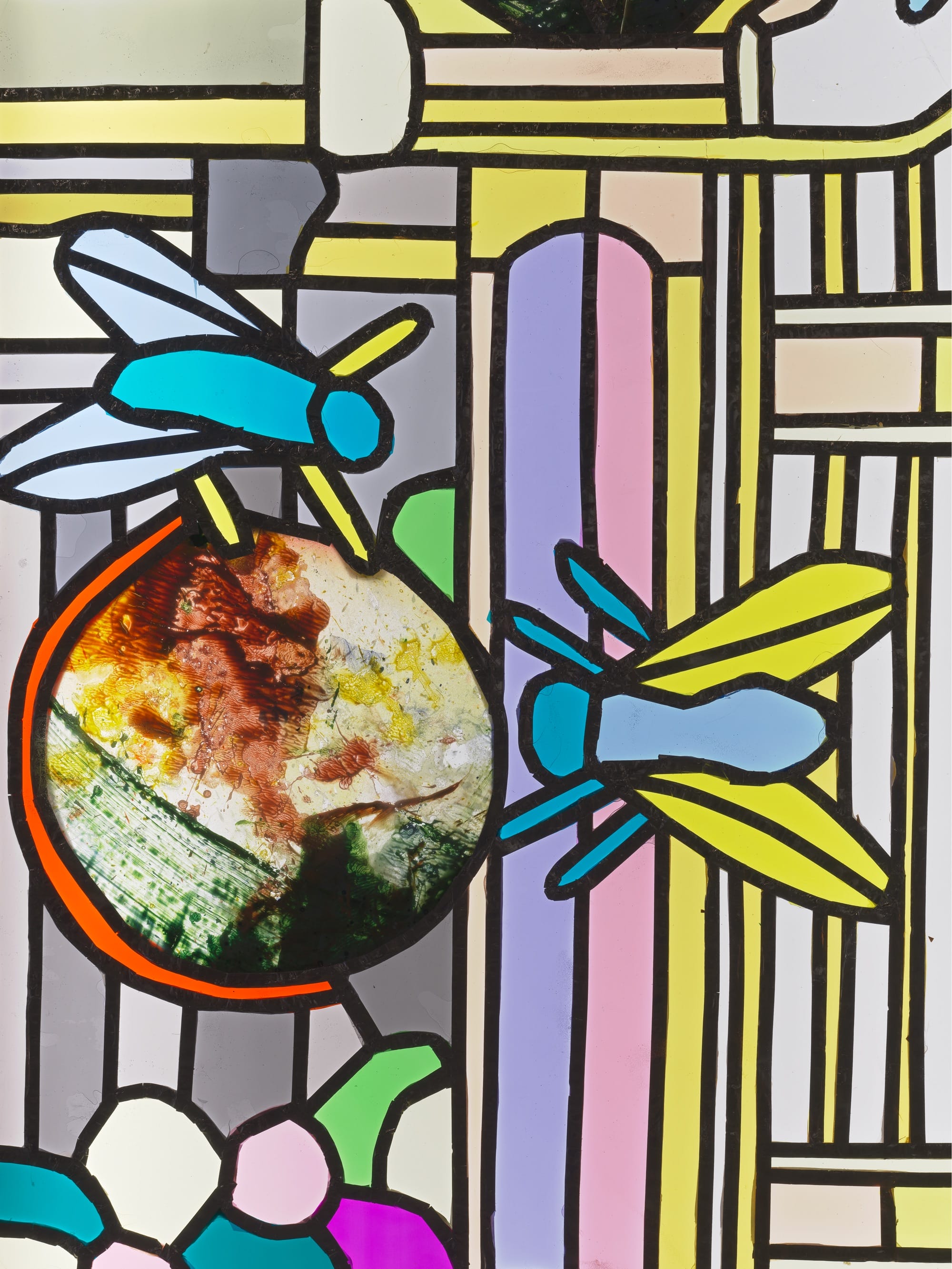 a detail image of a work by Raul de Nieves of two dragonflies on a globe