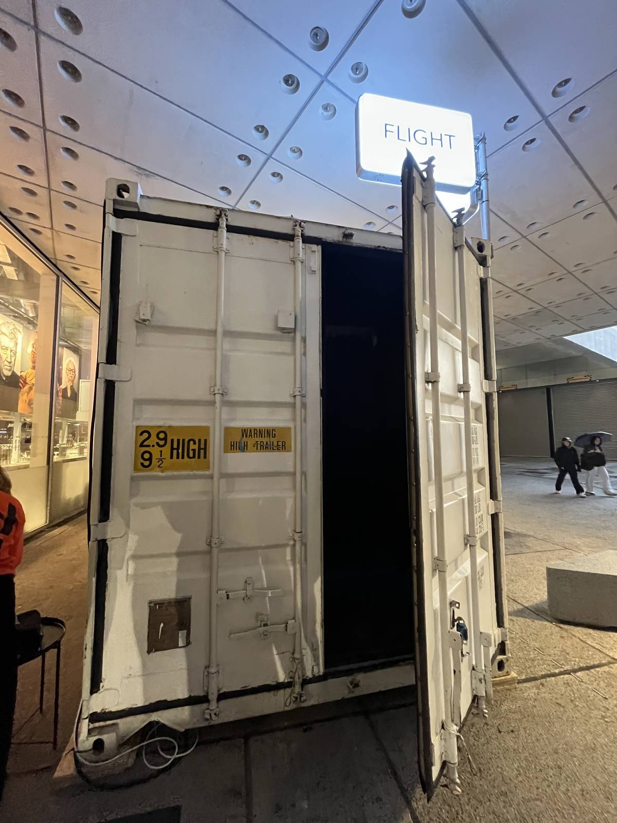 outside of white shipping container where one of the darkfield immersive experiences takes place in manchester