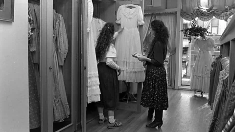 Getty Images The ultra-feminine appeal of the brand reached far and wide – pictured, the Laura Ashley boutique in Madison Avenue, NYC, 1983 (Credit: Getty Images)