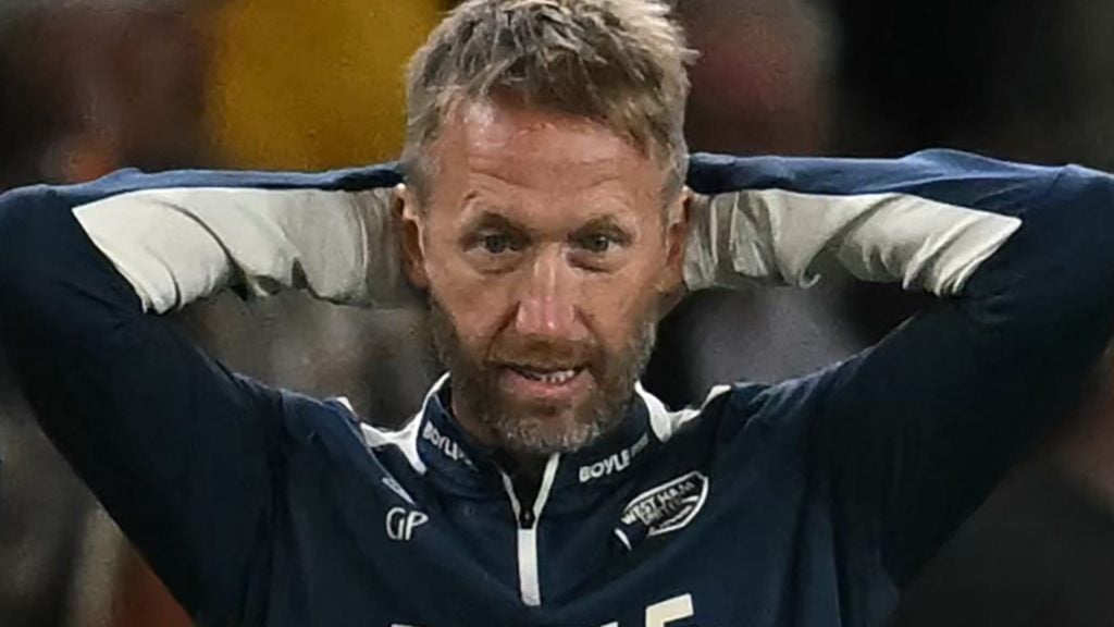 West Ham head coach Graham Potter holds his hands to his head in disbelief