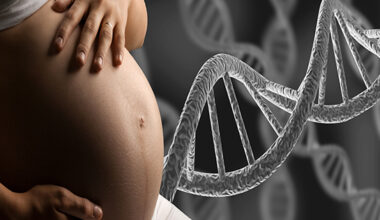 Pregnant woman holding belly with DNA strand background