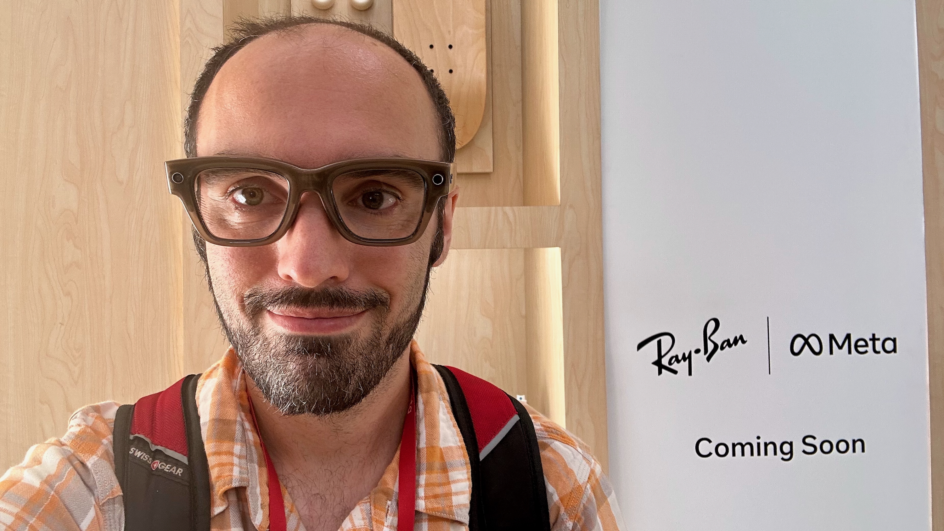 Photo of the author wearing brown Meta Ray-Ban Display glasses.