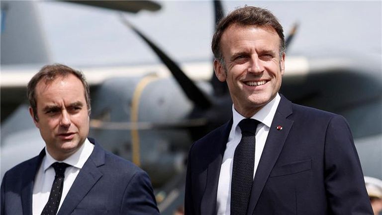 Sebastien Lecornu with Emmanuel Macron. Pic: AP