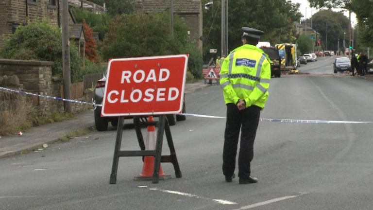 A policeman guards the cordon in Southfield Lane