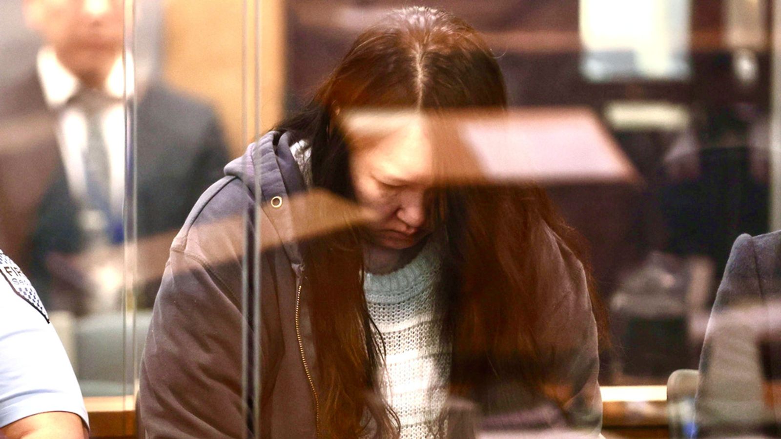 Hakyung Lee stands in the dock at the High Court in Auckland, New Zealand. Pic: AP