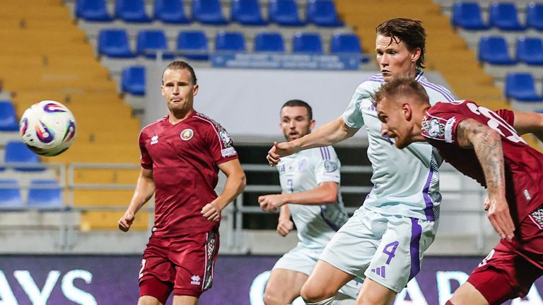 Belarus' Zakhar Volkov scores an own goal to make it 2-0 Scotland