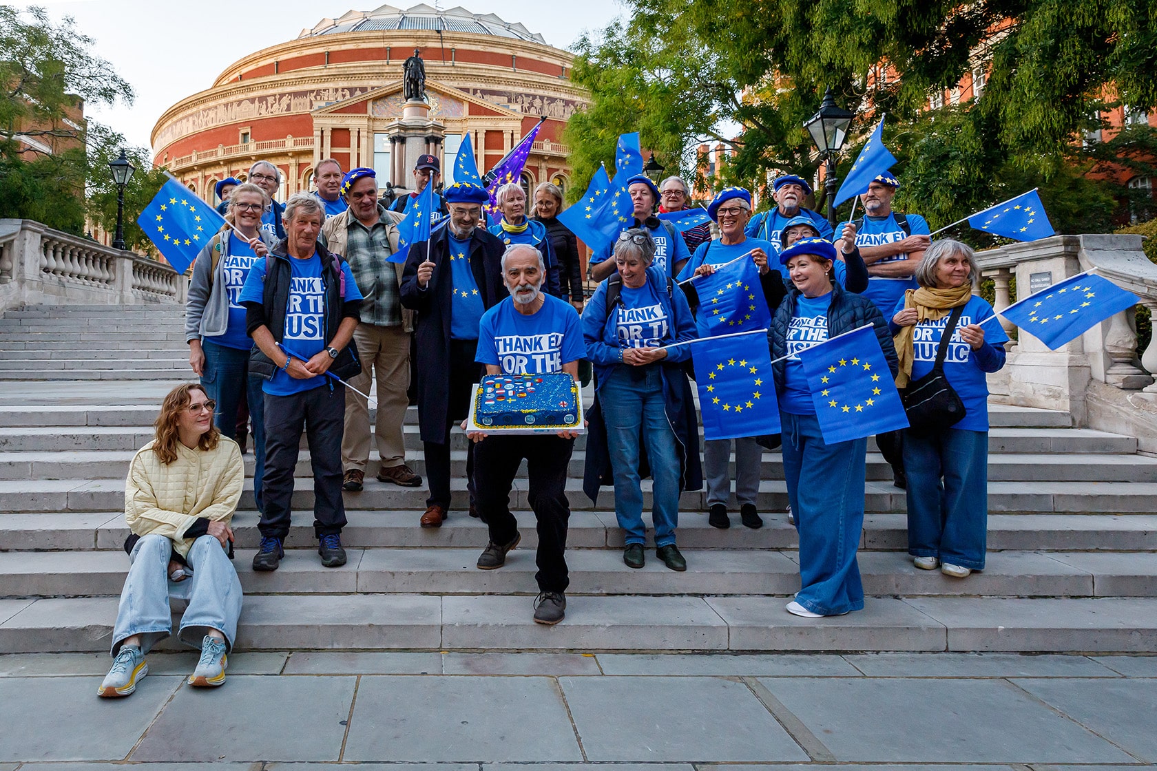 Thank EU for the Music group stand together in blue waving EU flags outside the Royal Albert Hall Last Night of the Proms