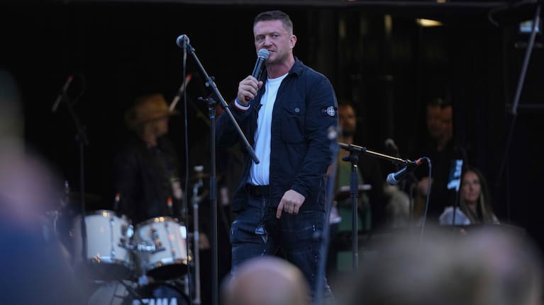 Tommy Robinson speaks during the Unite the Kingdom march and rally near Westminster