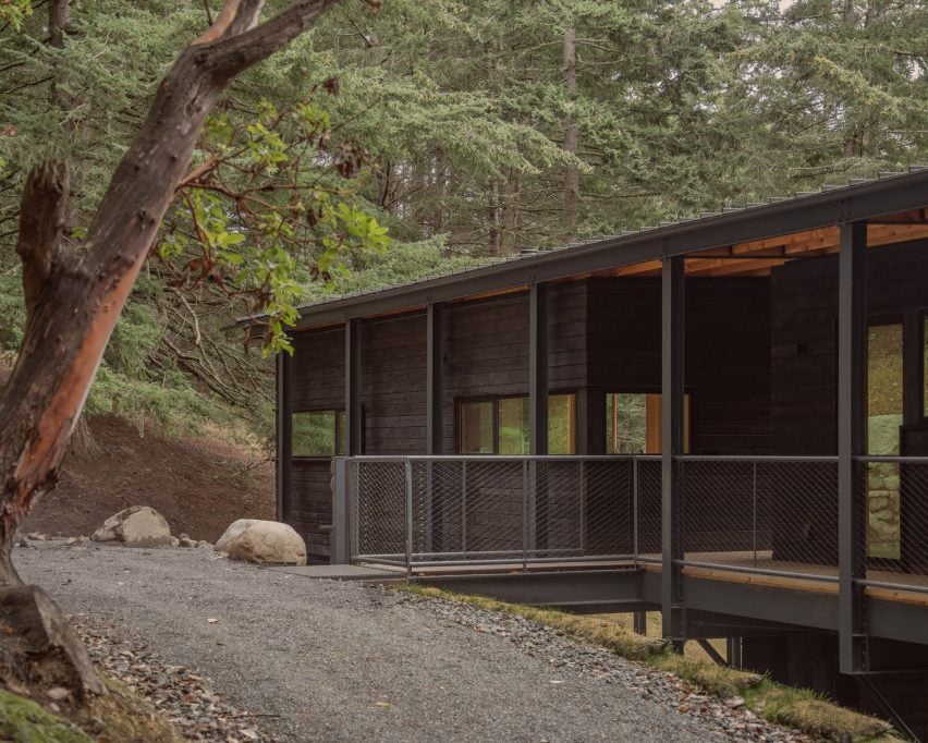 The cabin is broken into two separate modules that are covered by its overhanging roof