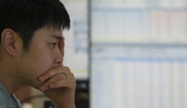 World shares mostly rise as a cut to US interest rates next week looks more certain