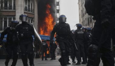 Protesters block roads and set blazes in France amid police tear gas