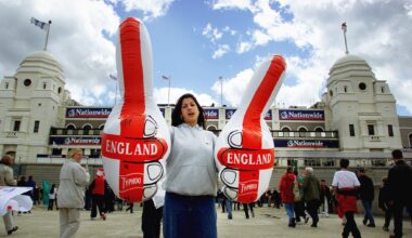 An England fan with inflatable thumbs at Wembley Stadium, 2000