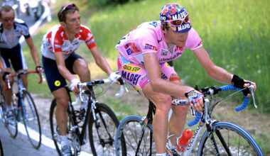 Cadel Evans wears the race-leader's jersey on stage sixteen of the 2002 Giro d'Italia from Corvara to Folgaria. (Photo by Graham Watson/Getty Images)