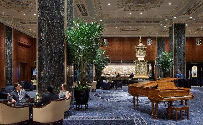 The 1893 World’s Fair clock sits at the centre of the hotel lobby