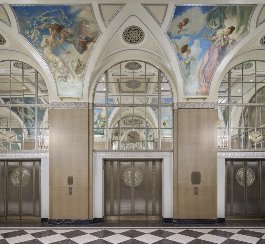 Grand corridor with elevator bank and murals on the ceilings