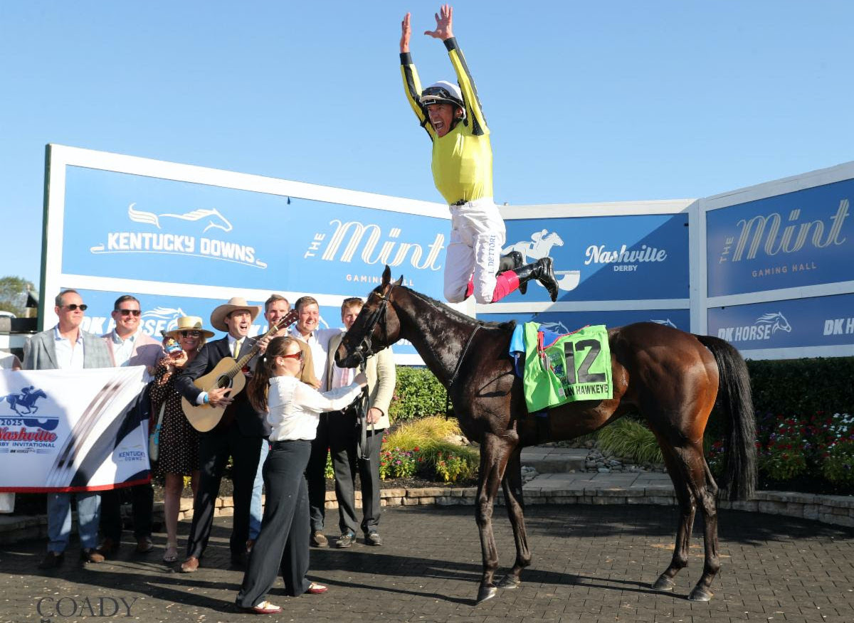 Flying dismount: Frankie Dettori in typical form after recent Nashville Derby win on Wimbledon Hawkeye. Photo: Coady Media / Renee Torbit
