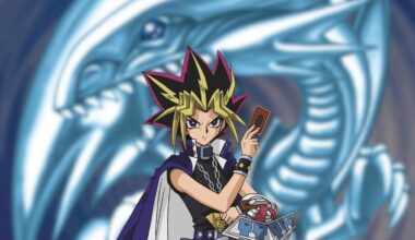 The protagonist of Yu-Gi-Oh holds a card while a blurred image of a dragon makes up the backdrop.