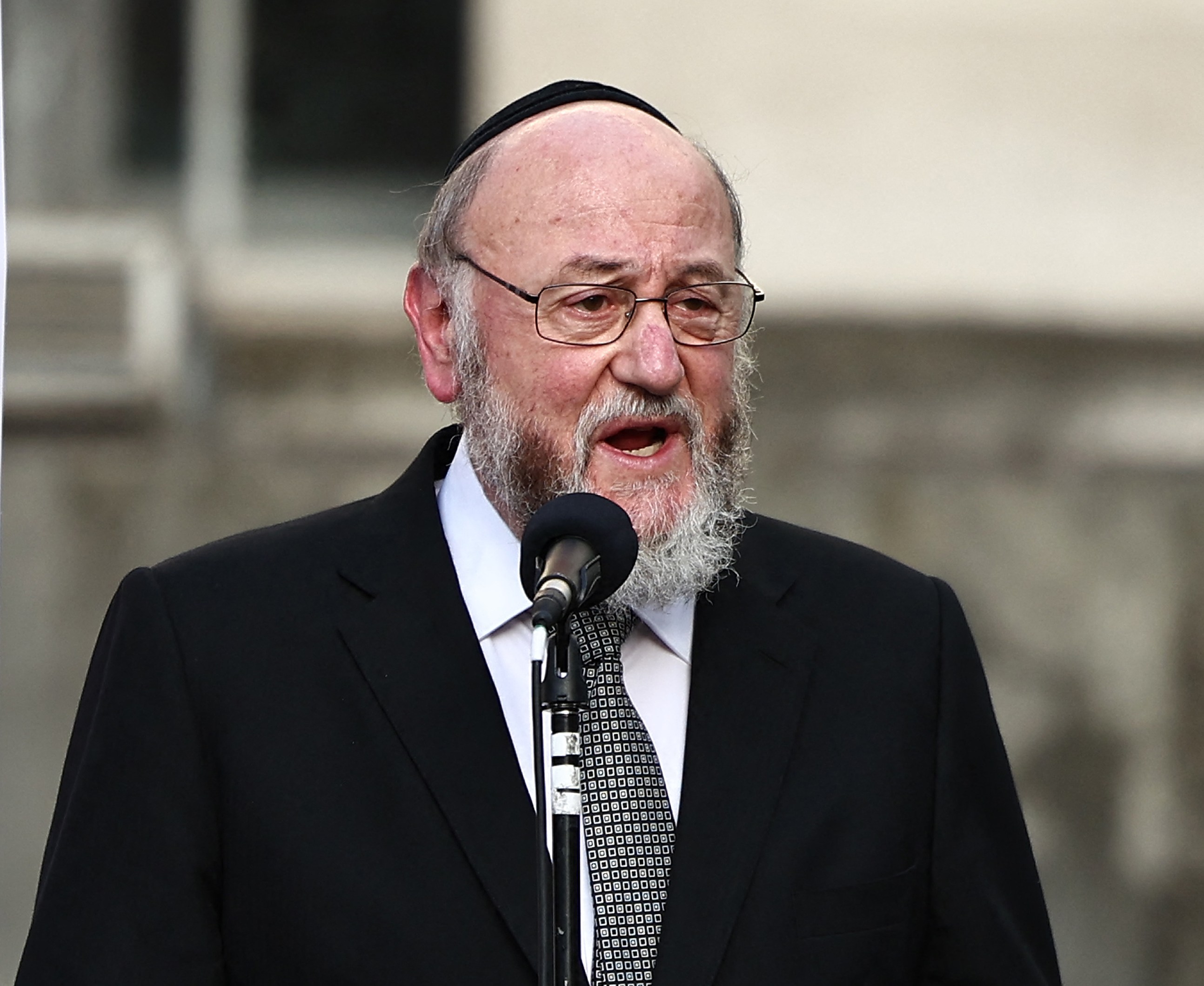 Sir Ephraim Mirvis giving an address during a vigil days after the October 7 attacks