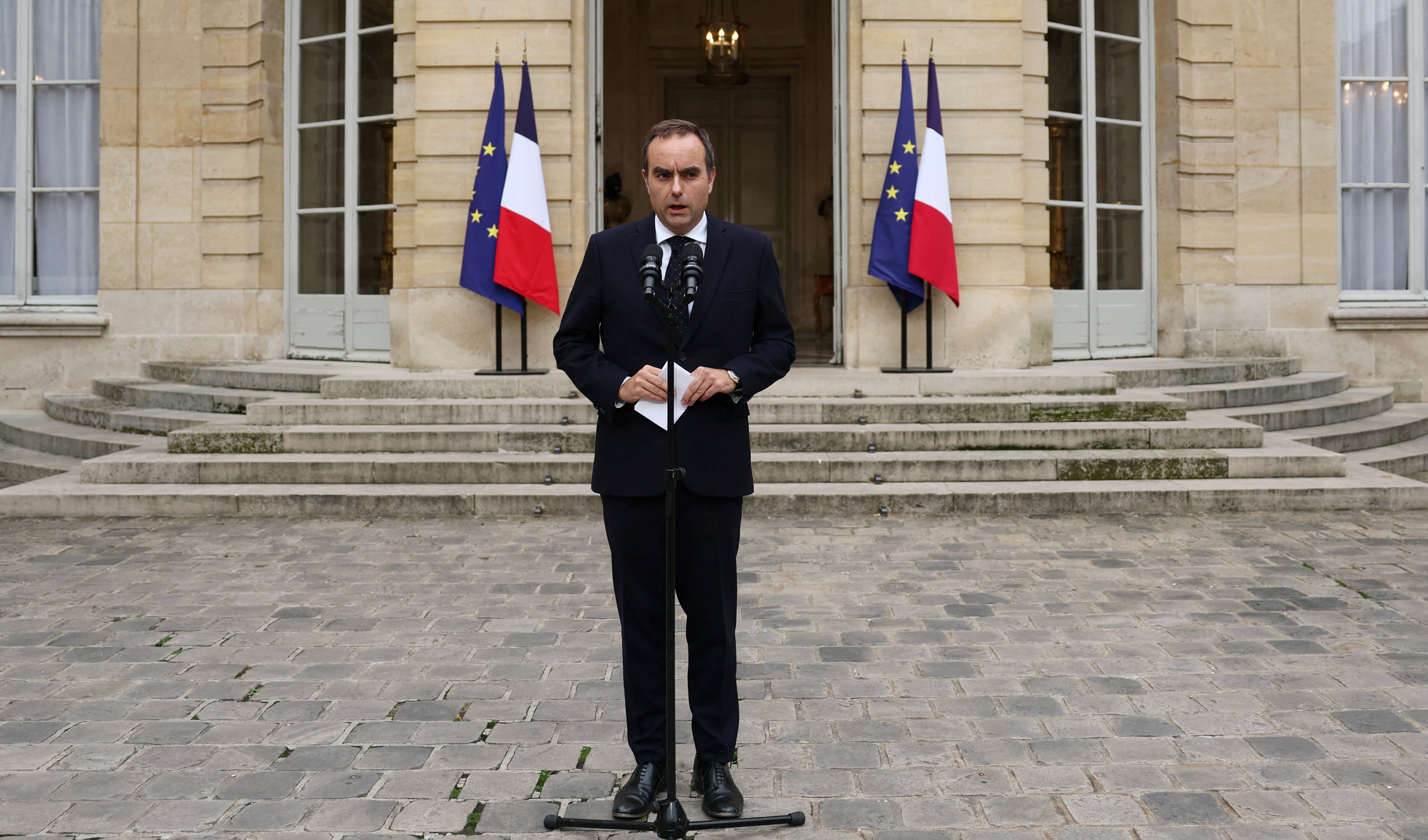 French outgoing Prime Minister Sebastien Lecornu delivers a statement at the Hotel Matignon in Paris.