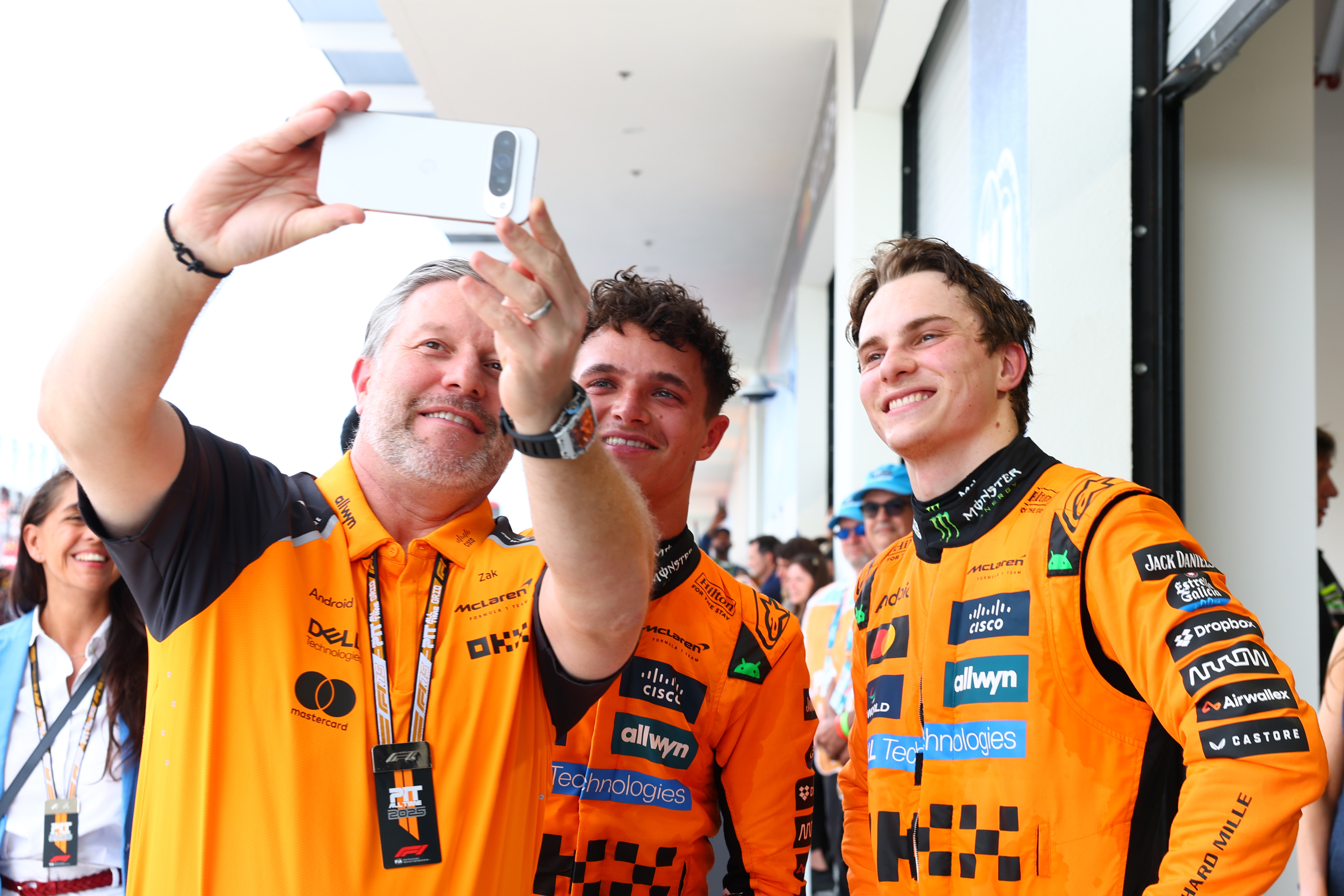 McLaren CEO Zak Brown takes a selfie with Oscar Piastri and Lando Norris at the F1 Grand Prix of Miami.