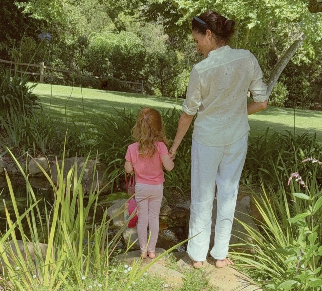 Meghan, Duchess of Sussex with her daughter Lilibet.