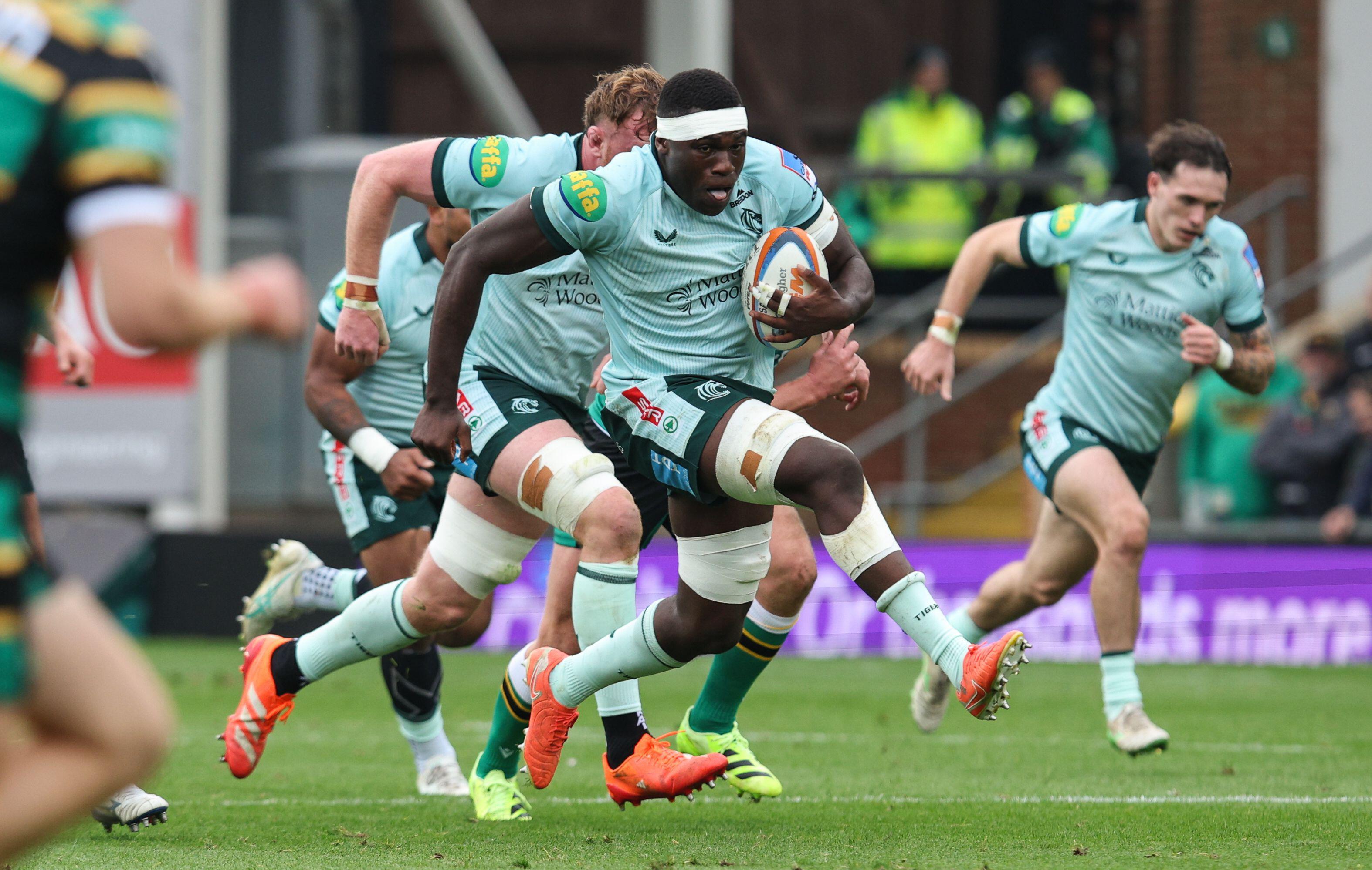 Emeka Ilione of Leicester Tigers making a break during a rugby match.