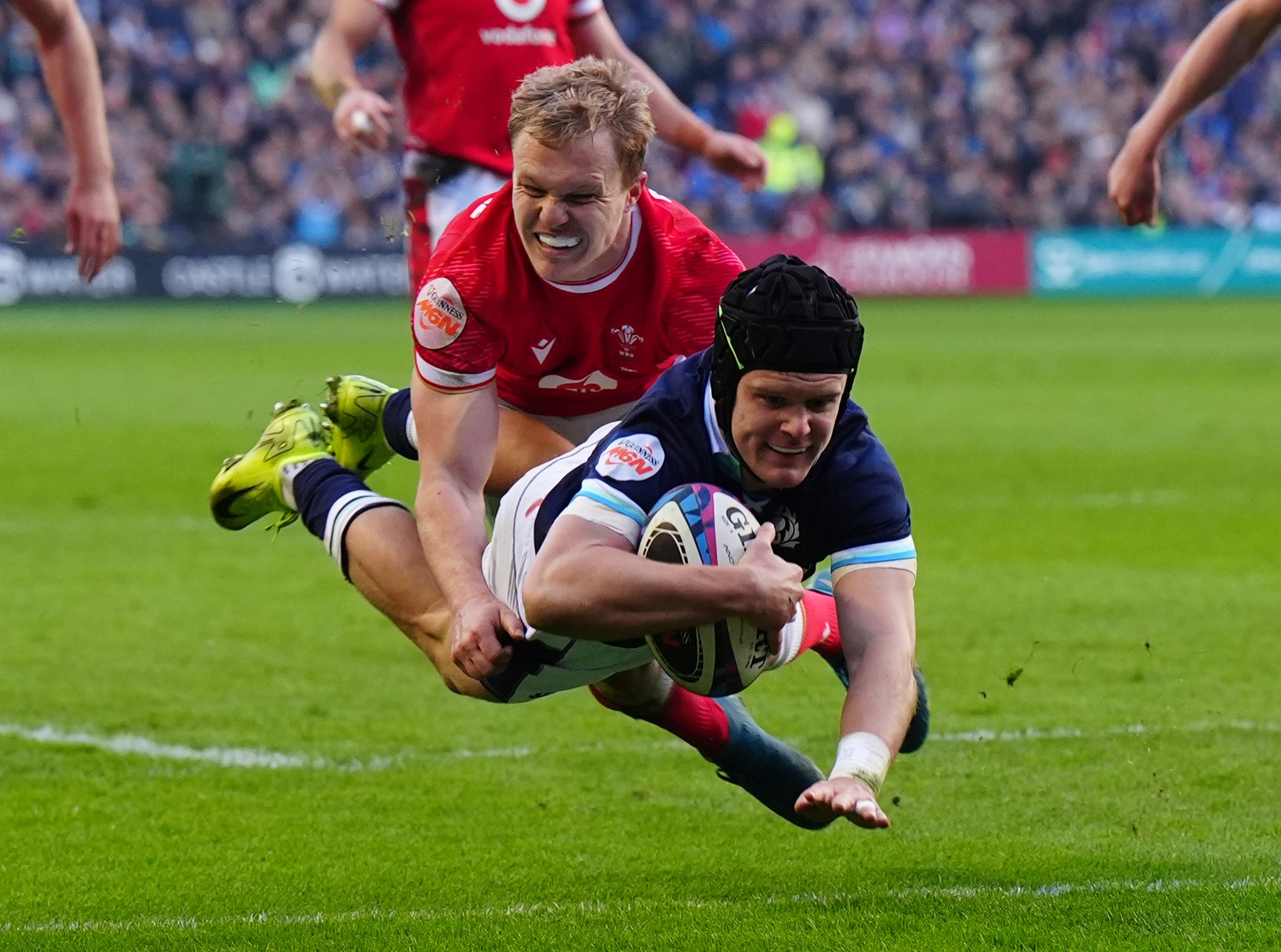 Darcy Graham scoring a try in a rugby match.