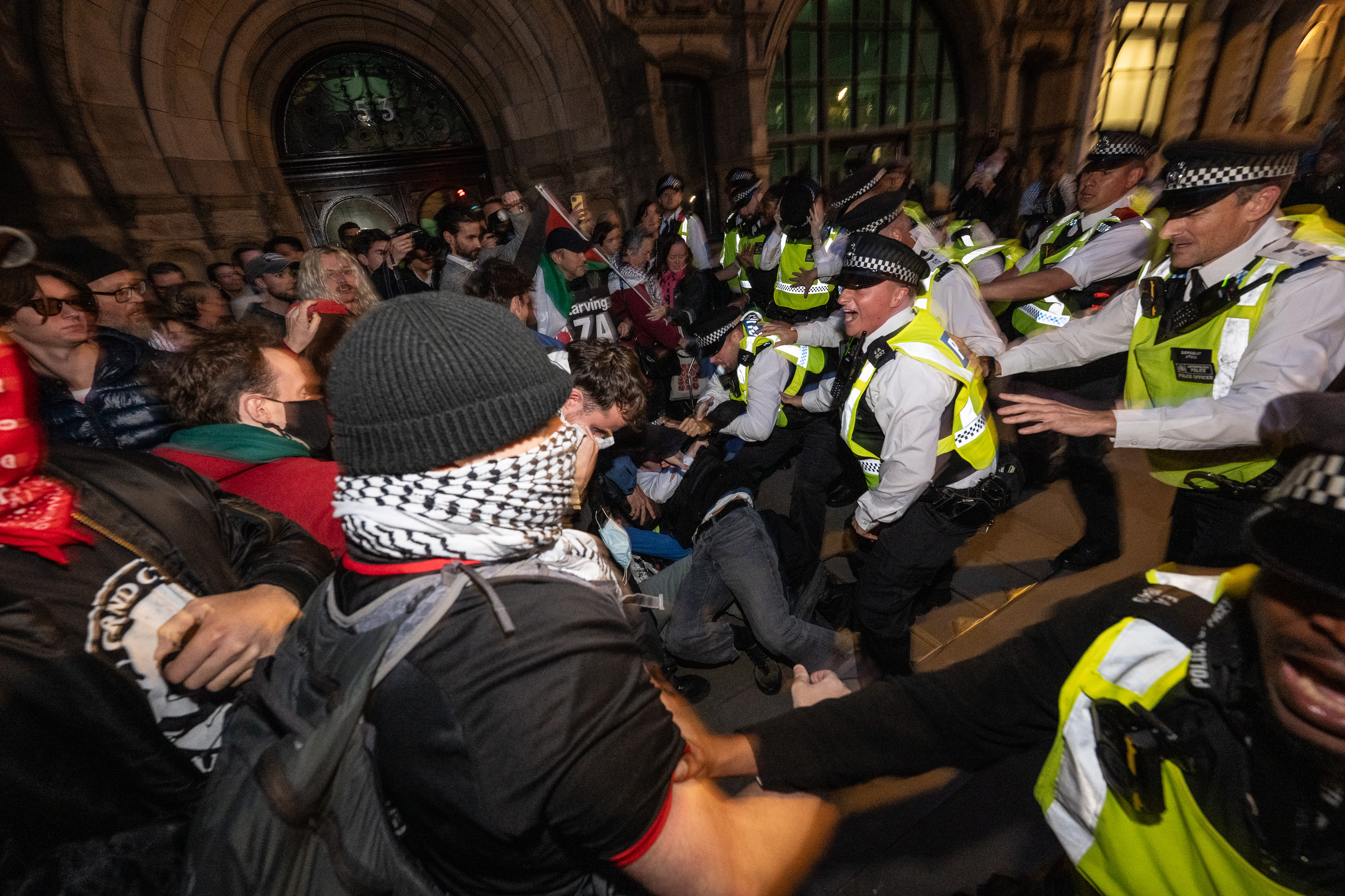 Police scuffle with protesters in Parliament Square on Thursday against Israel’s interception of the Gaza aid flotilla