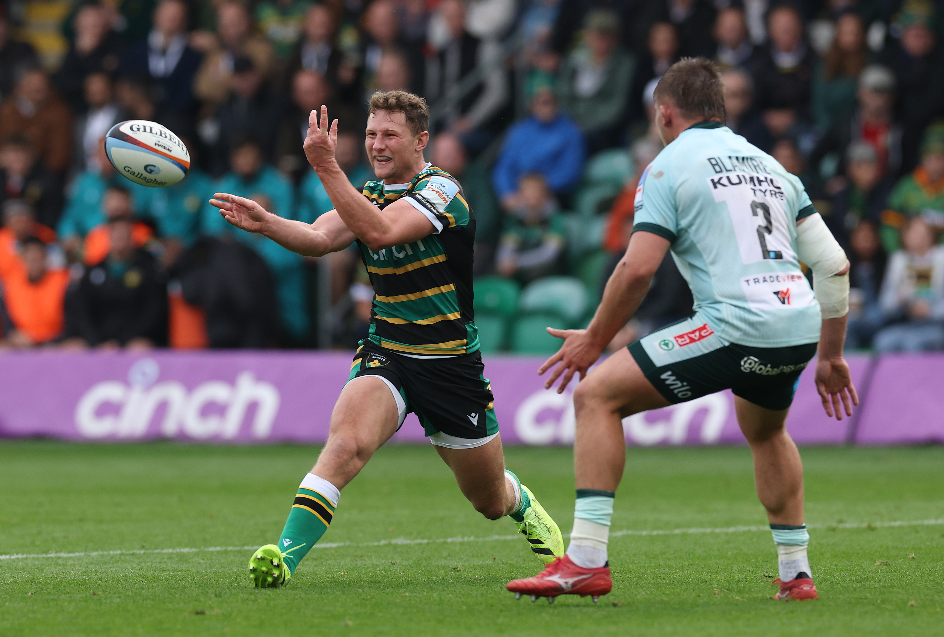 Fraser Dingwall of Northampton Saints passes the ball.