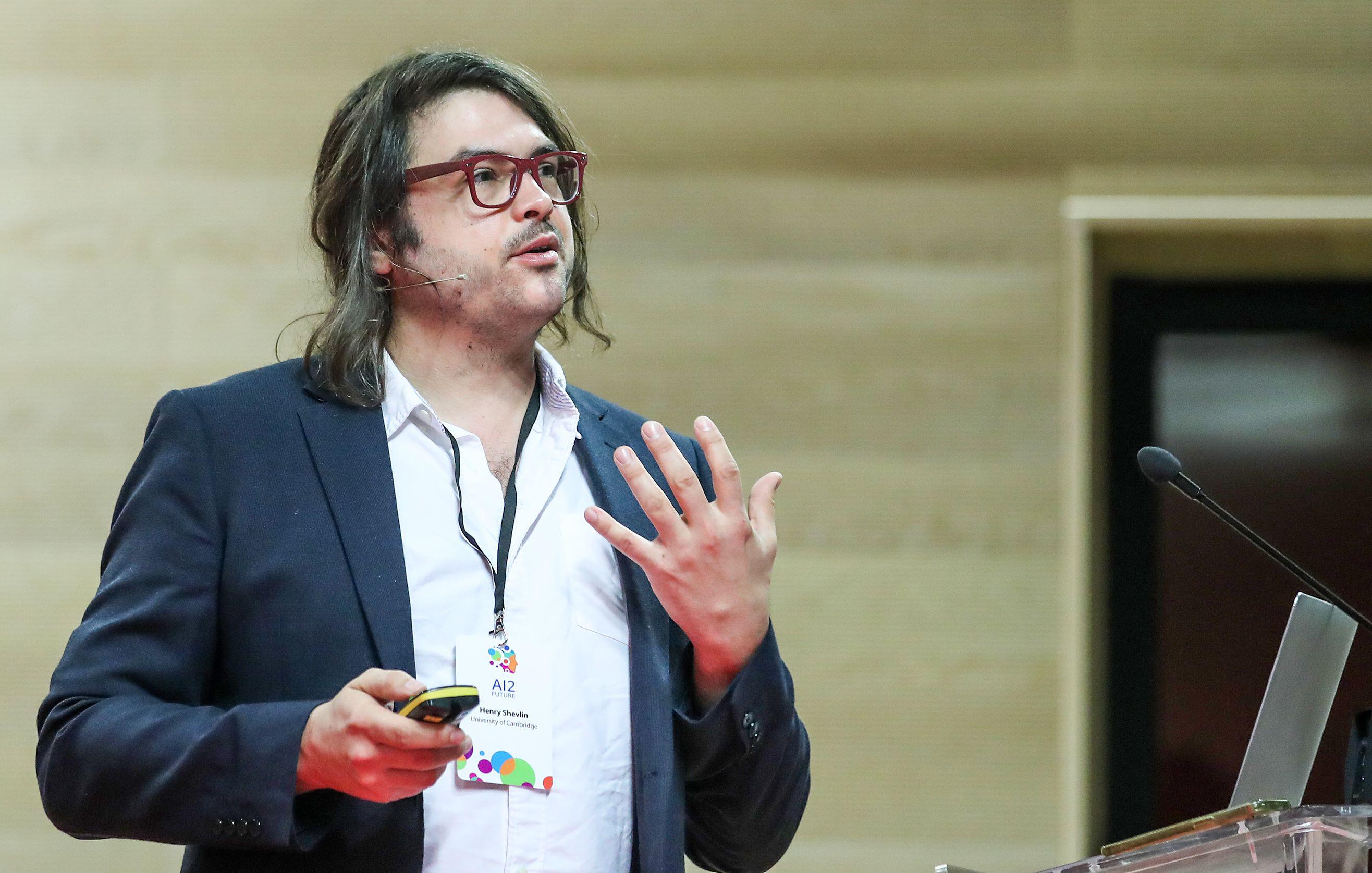 Henry Shevlin speaking at the AI2Future conference.