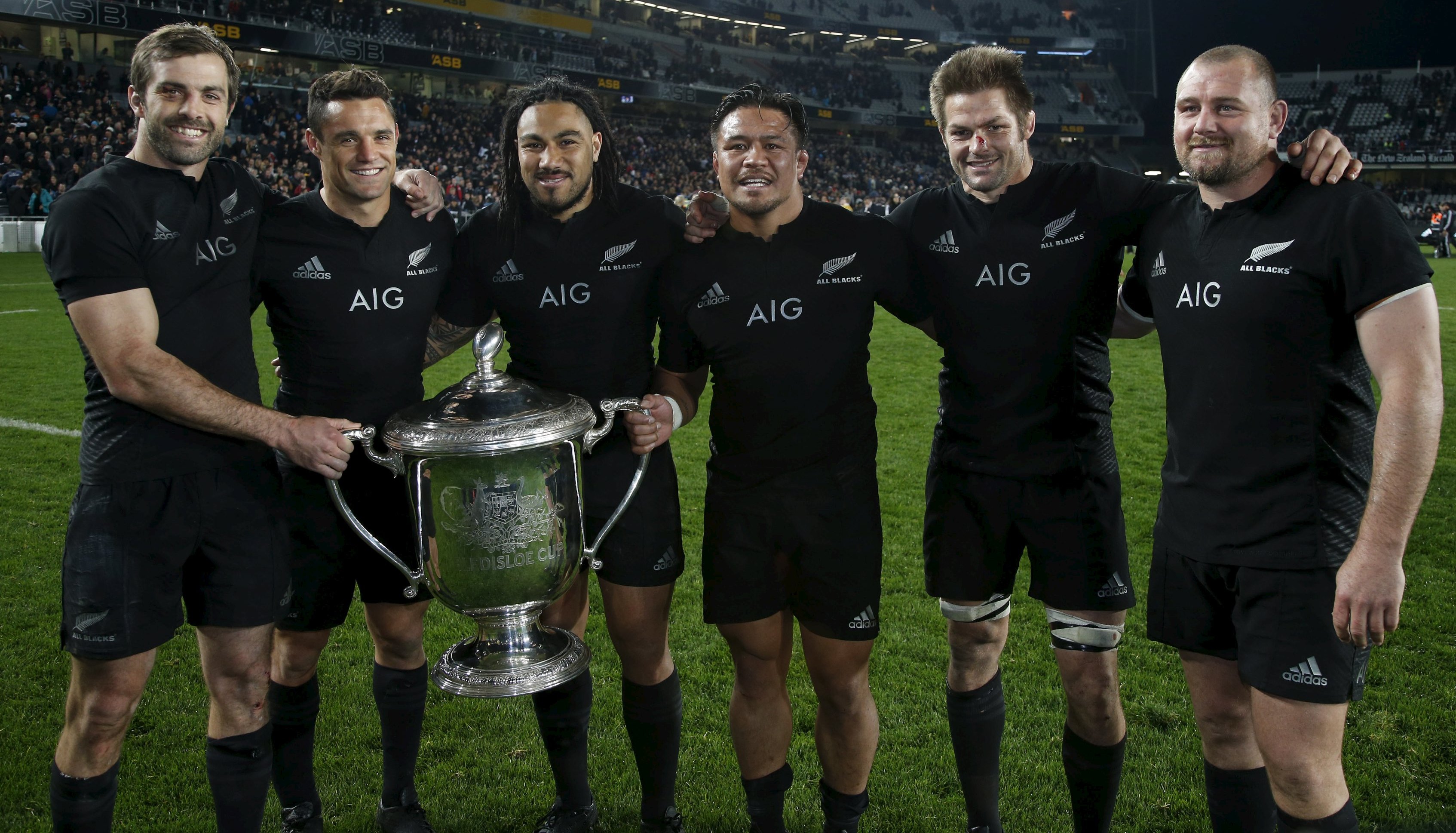 New Zealand All Black's players celebrate winning the Bledisloe Cup rugby match against Australia.