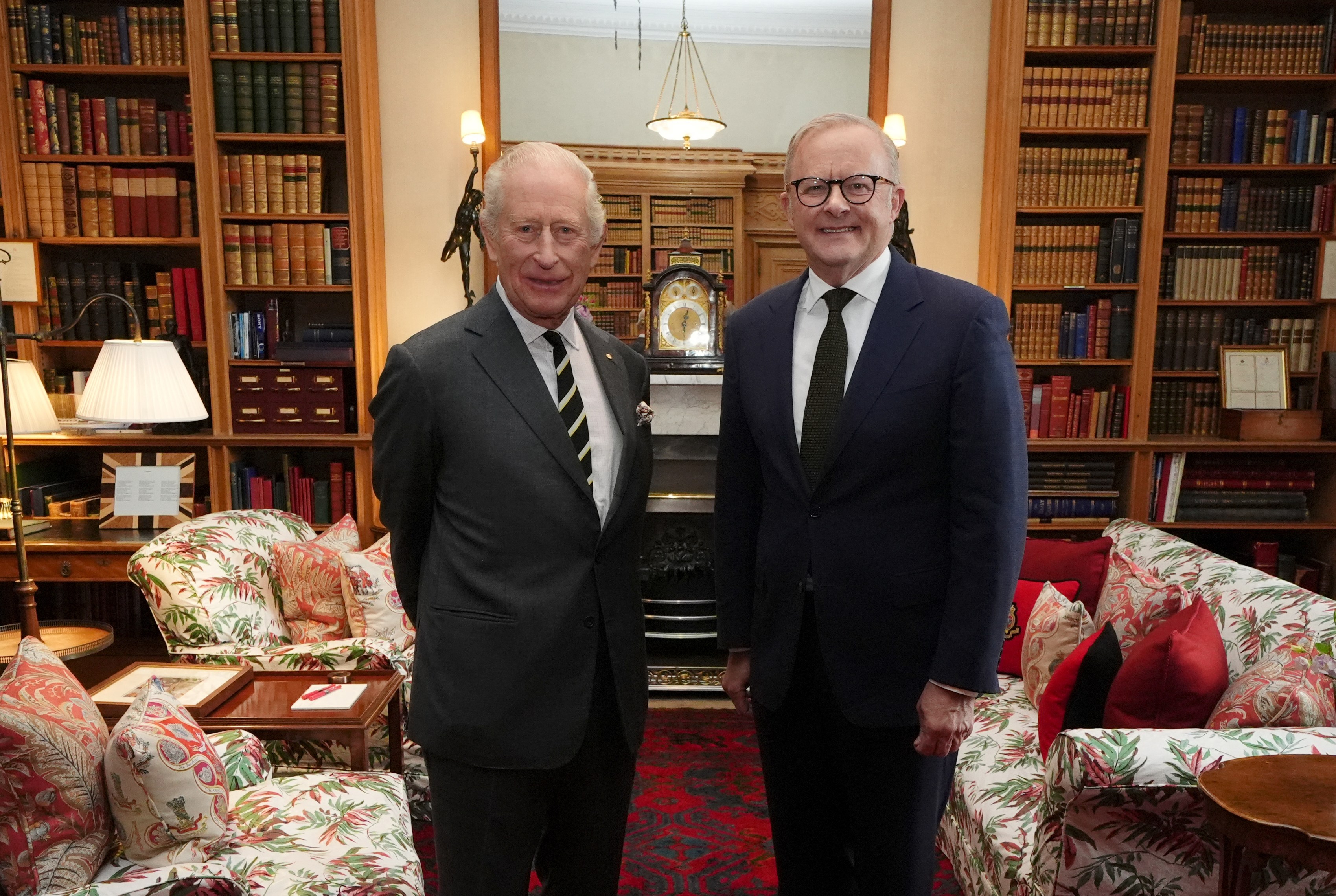 Britain's King Charles III and Australian Prime Minister Anthony Albanese pose for a photo.
