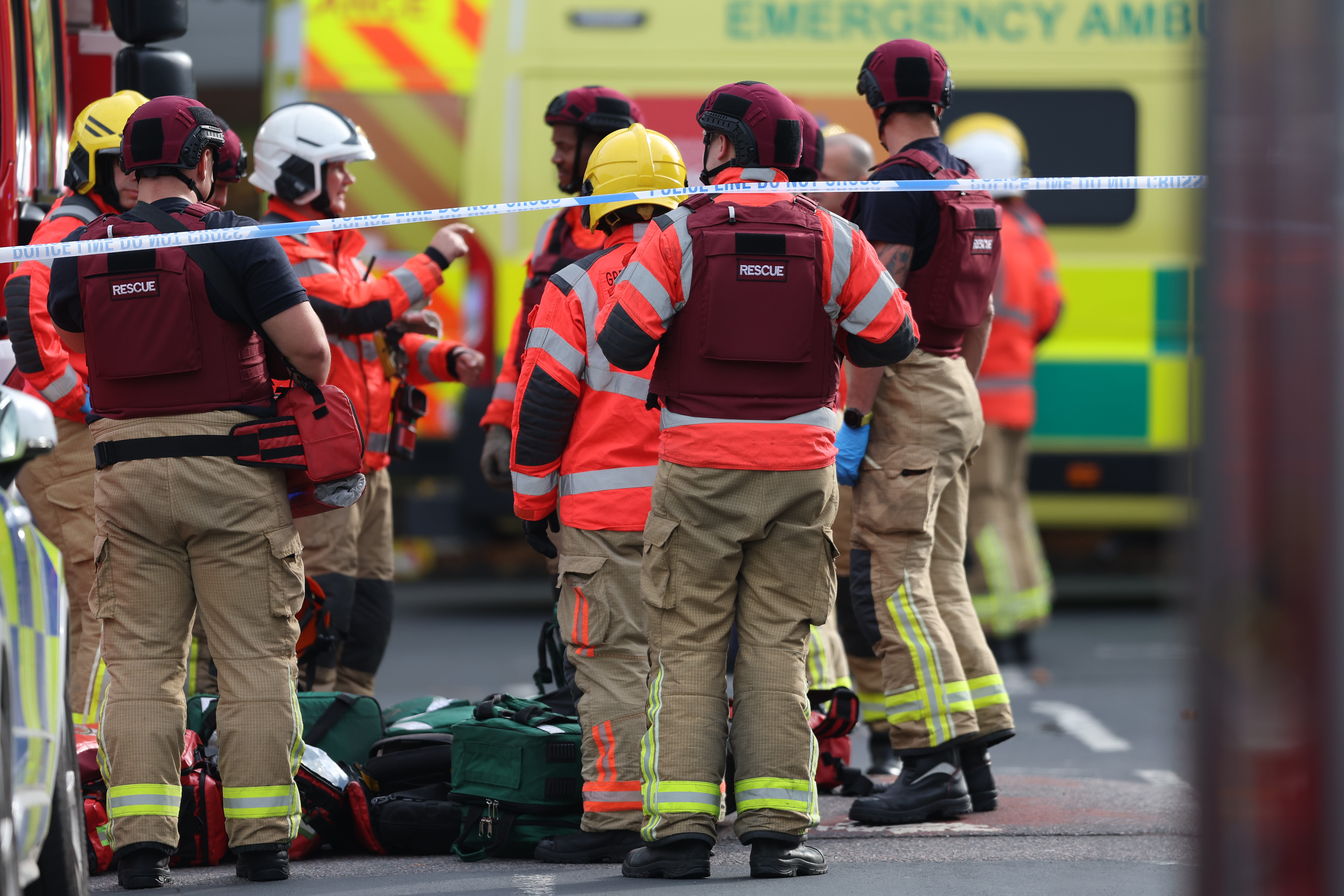 Police and first responders at the scene of a reported stabbing at a synagogue in Manchester.