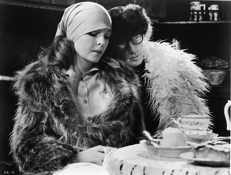 Woody Allen leans his head on Diane Keaton's shoulder in "Love and Death," circa 1975.
