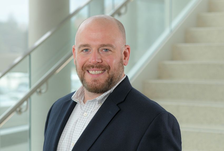 Geneticist Michael Lodato wears a dark suit jacket and stands in front of a staircase in this headshot photo. Geneticist Michael Lodato wears a dark suit jacket and stands in front of a staircase in this headshot photo.