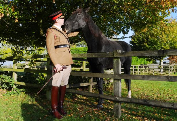 Life Guard Squadron Leader Major Tom Stewart says goodbye to Household Cavalry horse Quaker as he begins his retirement