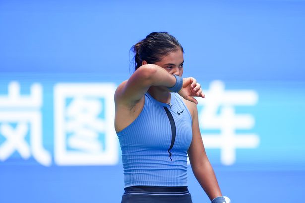 WUHAN, CHINA - OCTOBER 07: Emma Raducanu of Great Britain reacts in the Women's Singles Round of 64 match against Ann Li of United States on day 4 of 2025 Wuhan Open at Optics Valley International Tennis Center on October 7, 2025 in Wuhan, Hubei Province of China. (Photo by WUHAN OPEN OFFICIAL 2025/VCG via Getty Images)