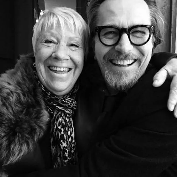 EastEnders star Laila Morse smiles for a picture with her arm around her actor brother Gary Oldman
