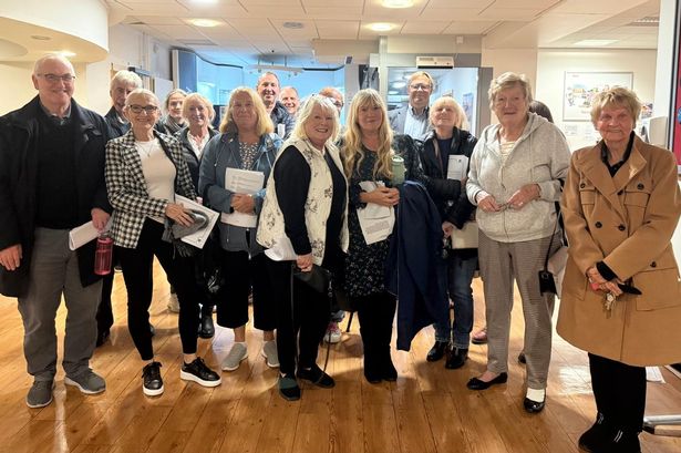 A group of residents at Huyton's Municipal Buildings campaigning against the current plans for Chapel Lane, south of Cronton