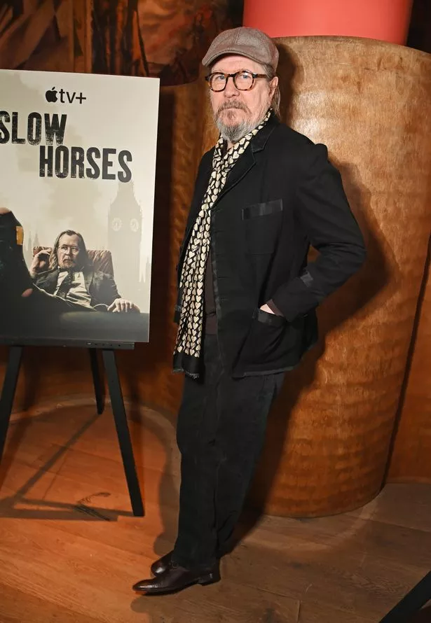 Gary Oldman attends a special screening for the new series of Slow Horses days before his visit to the palace