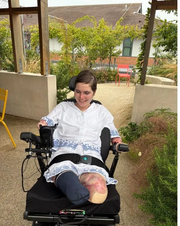 A young woman in a wheelchair