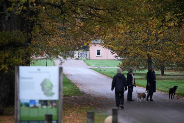 Dog walkers at the entrance near Royal Lodge