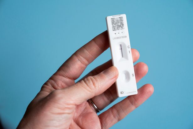 A Covid-19 rapid antigen test (lateral flow self test) showing a negative result