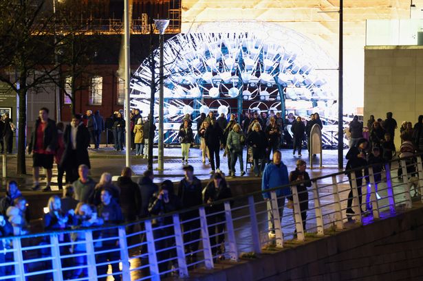Crowds enjoying the River of Light installations on Liverpool Pier Head on Friday October 24